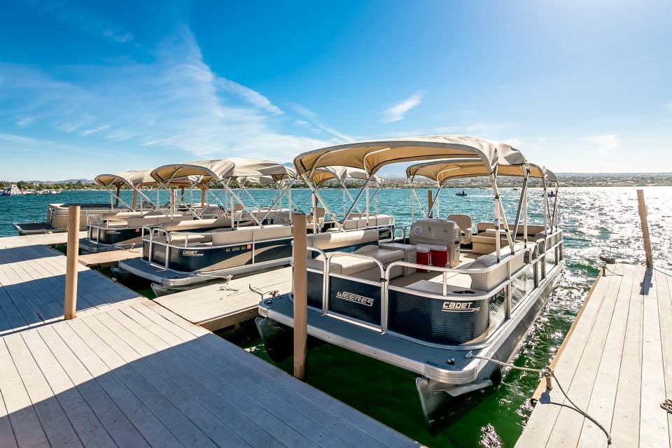 Photo of four boat rentals parked in a dock on Lake Havasu